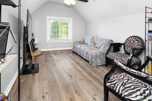 9208 S Dobson Ave, Chicago, IL 60619 - living room with vaulted ceiling, baseboards, a ceiling fan, and wood finished floors