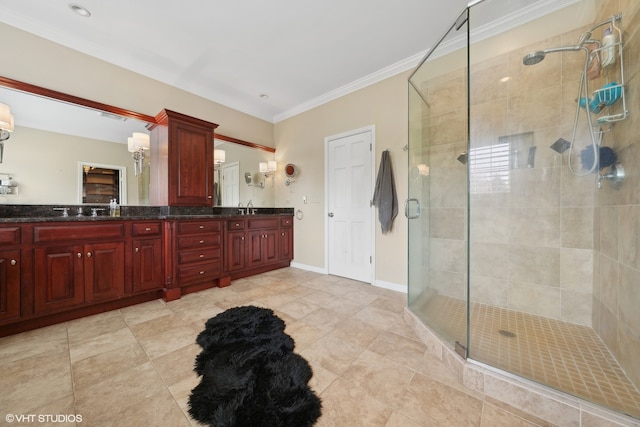 bathroom featuring vanity, an enclosed shower, and crown molding