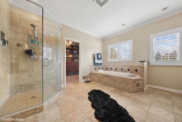 bathroom featuring tile patterned flooring, ornamental molding, and shower with separate bathtub