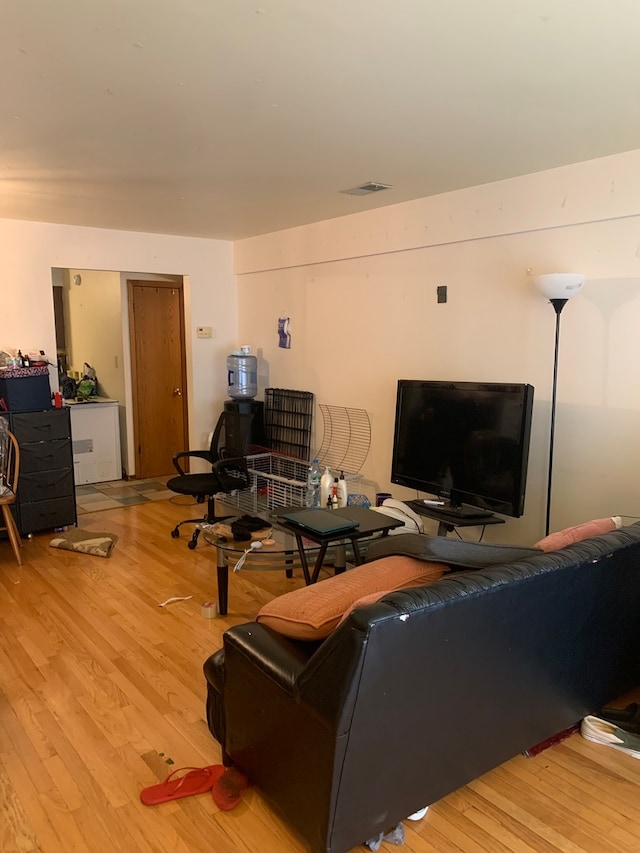 living room with light hardwood / wood-style floors