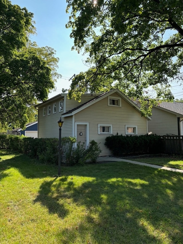 view of front of home with a front yard