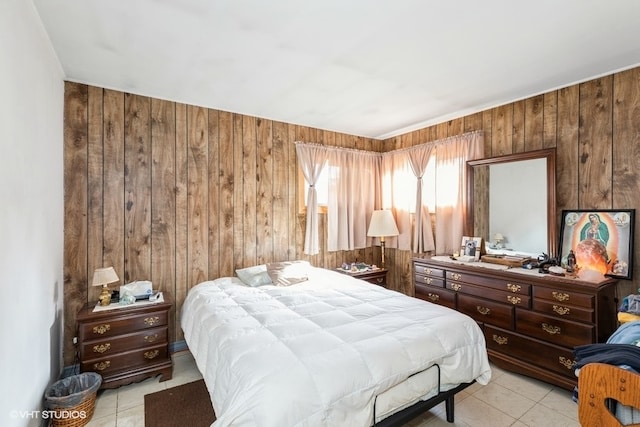 tiled bedroom featuring wood walls