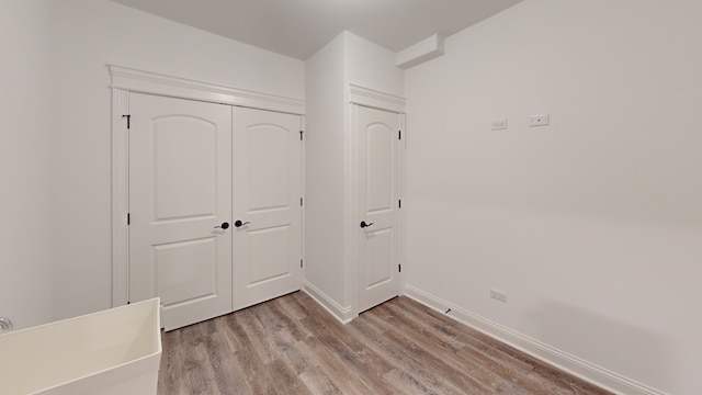 hall featuring light hardwood / wood-style floors