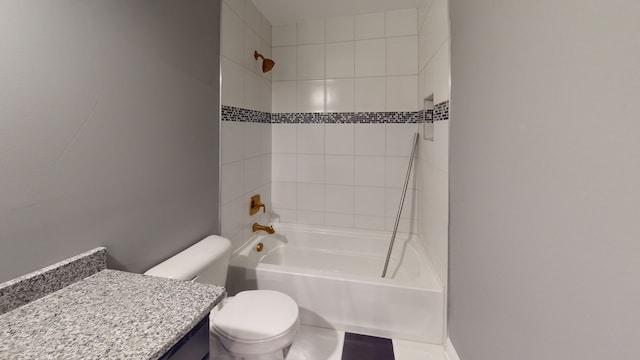 full bathroom with vanity, toilet, and tiled shower / bath combo