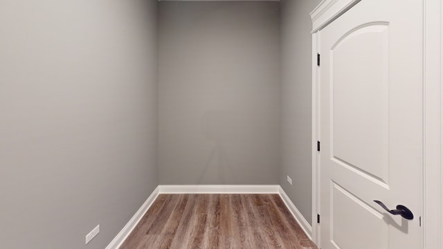 unfurnished room with light hardwood / wood-style floors