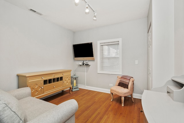 living room with hardwood / wood-style flooring