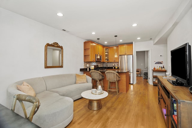 living room featuring light hardwood / wood-style flooring