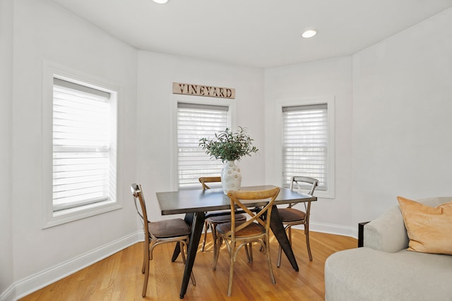 dining room with light wood-type flooring