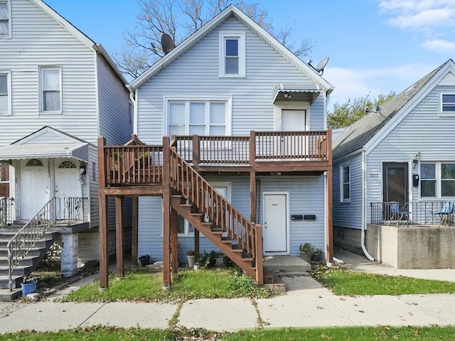 view of front of house with a wooden deck