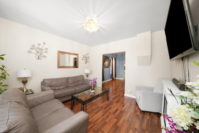 living room featuring dark wood-type flooring