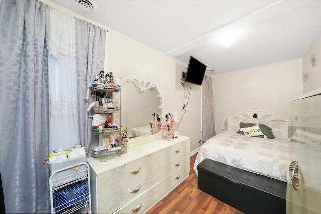 bedroom featuring hardwood / wood-style floors