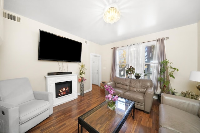 living room featuring dark hardwood / wood-style floors