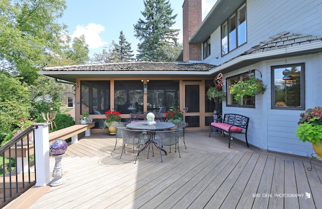 deck featuring a sunroom