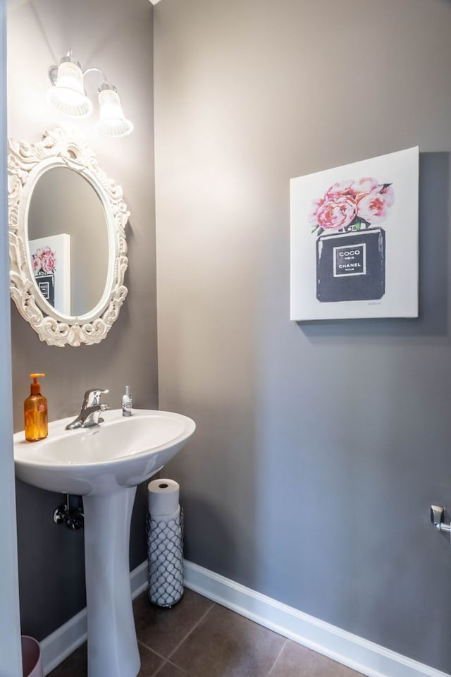 bathroom featuring tile patterned floors and sink