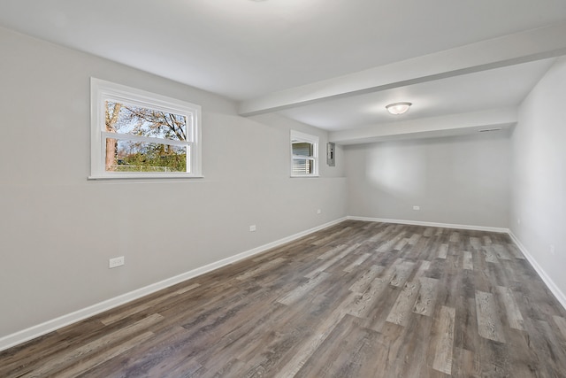 basement featuring hardwood / wood-style floors