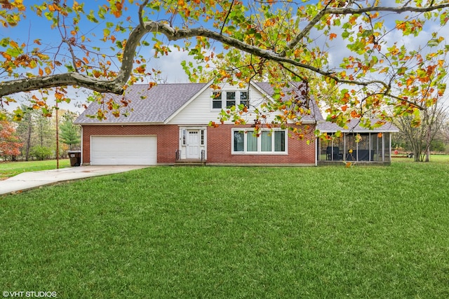 view of front of home featuring a garage, a front yard, and a sunroom