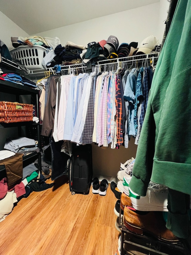 walk in closet featuring hardwood / wood-style flooring