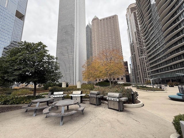 surrounding community featuring a patio area