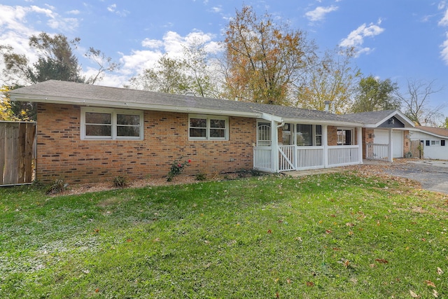 ranch-style home with a front yard