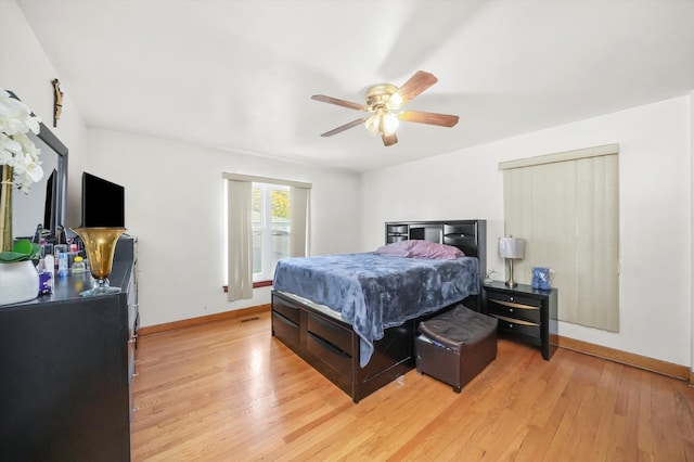 bedroom featuring ceiling fan and light hardwood / wood-style flooring