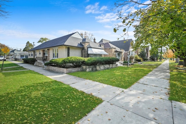 view of home's exterior with a yard