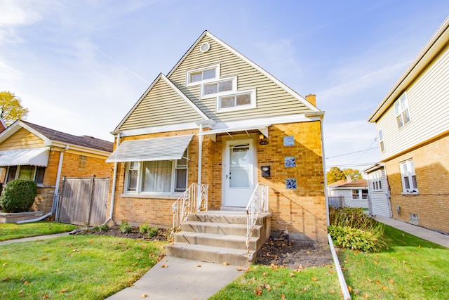 view of front of home with a front lawn