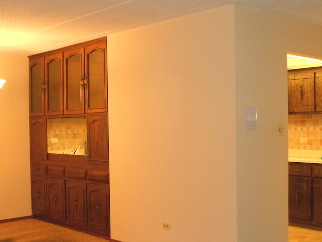 corridor with a textured ceiling