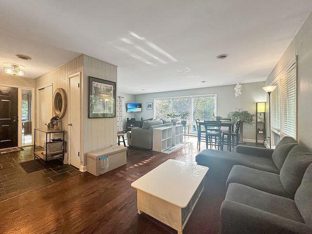 living room featuring dark hardwood / wood-style flooring