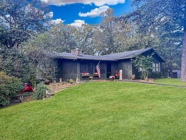 ranch-style house with a front yard