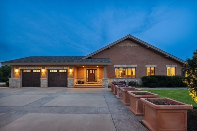 view of front of property featuring a garage