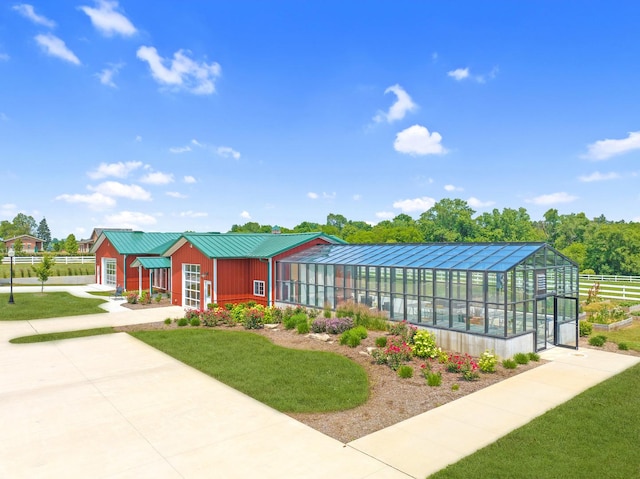 view of property's community with an outdoor structure