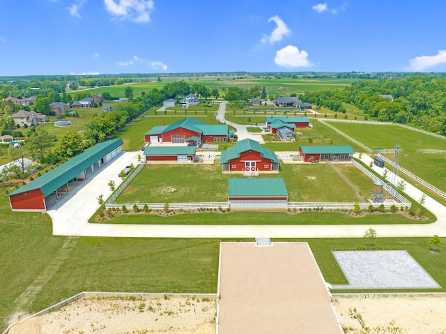 birds eye view of property featuring a rural view