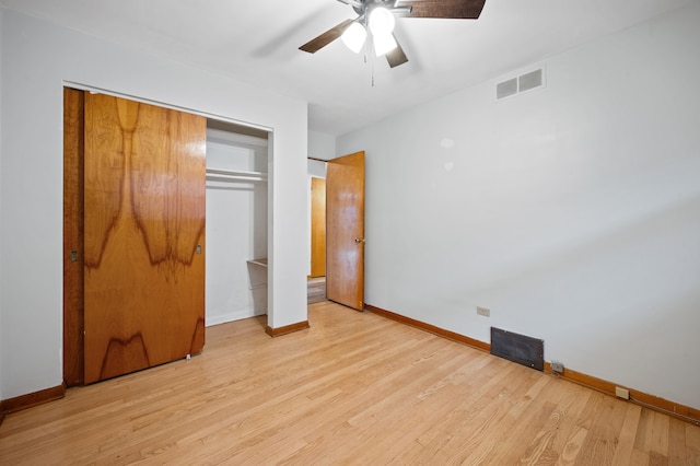 unfurnished bedroom with a closet, ceiling fan, and light wood-type flooring