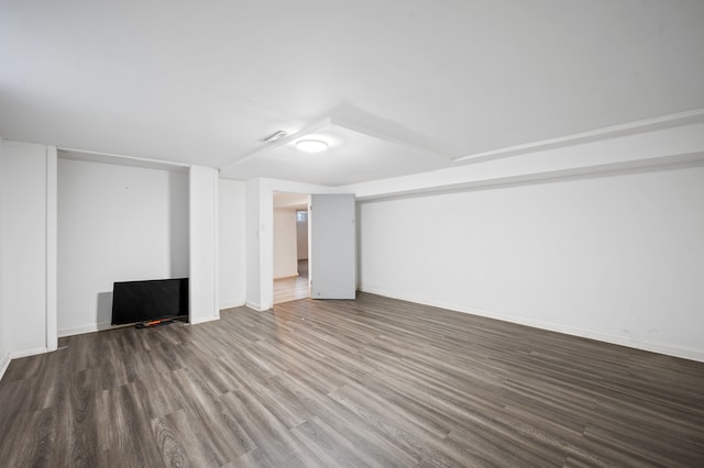 basement with wood-type flooring