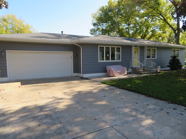 ranch-style house with a garage