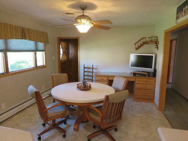 dining room with ceiling fan