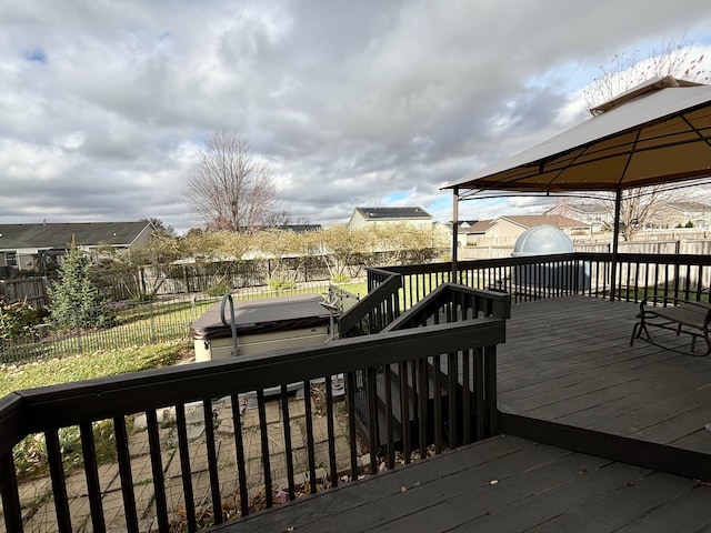 wooden deck with a gazebo