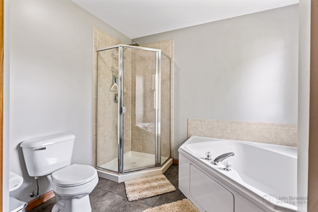 bathroom with tile patterned flooring, plus walk in shower, and toilet