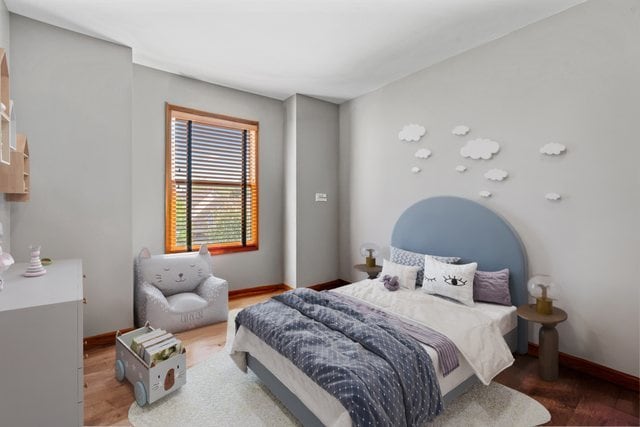 bedroom with wood-type flooring