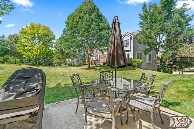 view of patio featuring a grill