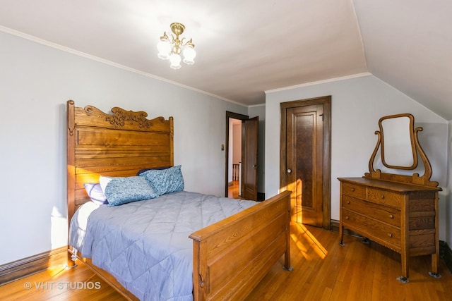 bonus room with lofted ceiling, light wood-type flooring, radiator, and a wealth of natural light