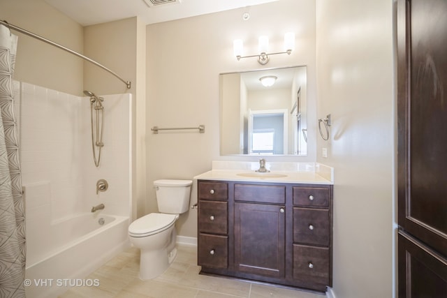 full bathroom with vanity, shower / tub combo with curtain, toilet, and tile patterned flooring