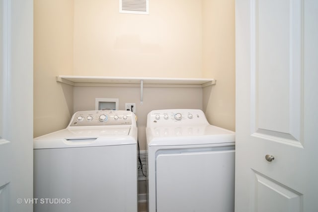 laundry room featuring washer and dryer