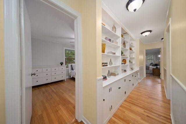 corridor with light wood-style flooring