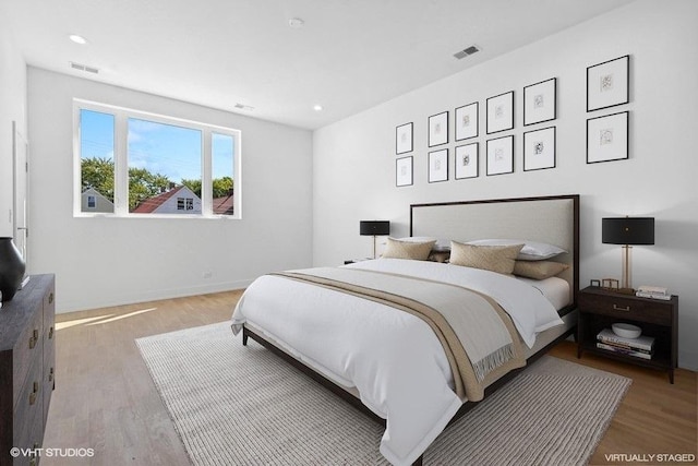 bedroom featuring light hardwood / wood-style flooring