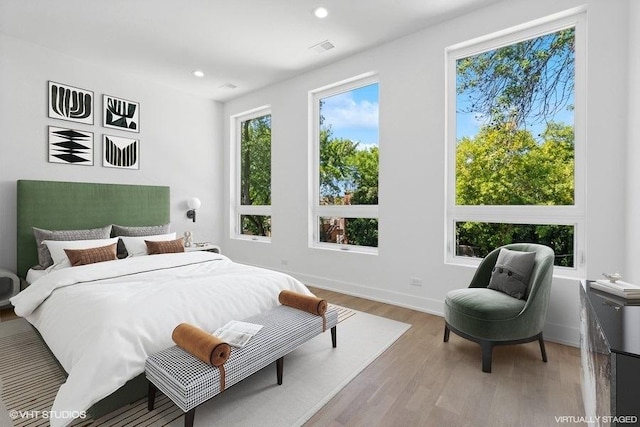 bedroom with light wood-type flooring