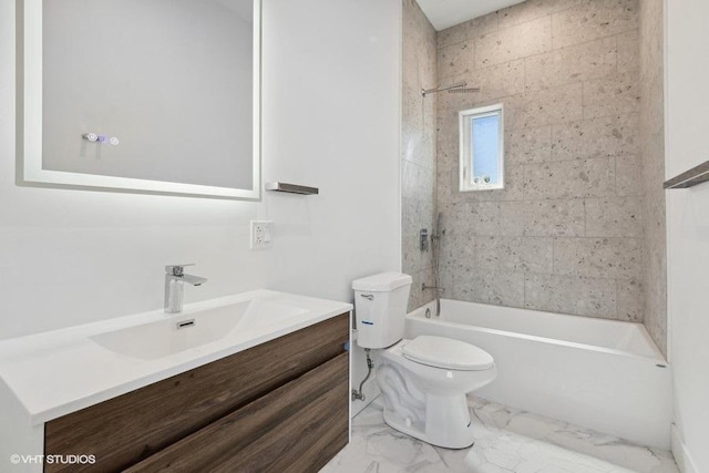 full bathroom featuring tiled shower / bath combo, vanity, and toilet