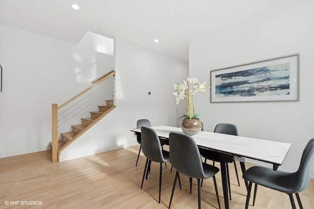 dining room with light hardwood / wood-style flooring