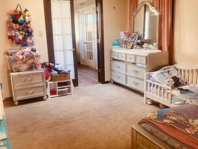 bedroom with light colored carpet