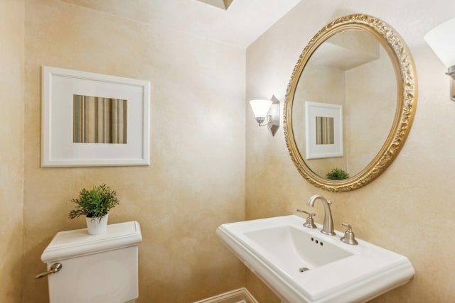 27 N Tower Rd Unit 27, Oak Brook, IL 60523 - half bathroom featuring toilet and a sink